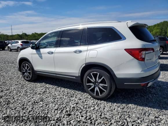 2021 Honda Pilot Touring 7-Passenger z VIN 5FNYF6H69MB060251, wystawiony jako Copart lot #56564255 z przebiegiem 30 118 mil mil oraz Szkoda całkowita • Salvage title. Historia ofert i sprzedaży dostępna na DreamBid. Obrazek 2.