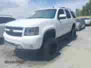 2010 Chevrolet Tahoe LT with VIN 1GNMCBE34AR148552, listed as a IAAI auction lot 43130672 with 193,030 mi miles and . Bid and sale history available at DreamBid. Image 2.