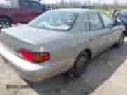 1995 Toyota Camry DX z VIN 4T1SK11E8SU586716, wystawiony jako IAAI lot #42116989 z przebiegiem 119 778 mil mil oraz . Historia ofert i sprzedaży dostępna na DreamBid. Obrazek 4.