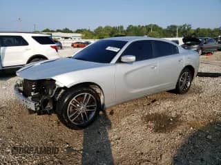 2019 Dodge Charger SXT with VIN 2C3CDXJGXKH577305, listed as a Copart auction lot 68280445 with 112,918 mi miles and Salvage title. Bid and sale history available at DreamBid. Image 1.
