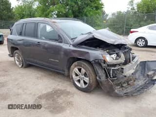 2014 Jeep Compass Sport z VIN 1C4NJCBB7ED826248, wystawiony jako IAAI lot #42594265 z przebiegiem 103 053 mil mil oraz . Historia ofert i sprzedaży dostępna na DreamBid. Obrazek 1.