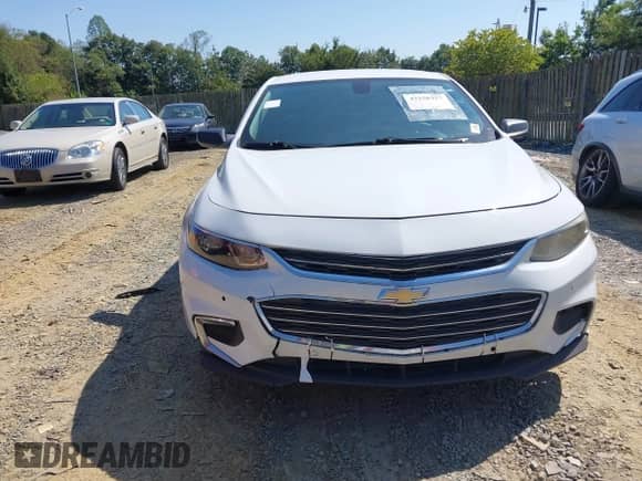 2018 Chevrolet Malibu LS z VIN 1G1ZB5ST5JF184350, wystawiony jako IAAI lot #43258357 z przebiegiem 143 440 mil mil oraz . Historia ofert i sprzedaży dostępna na DreamBid. Obrazek 6.