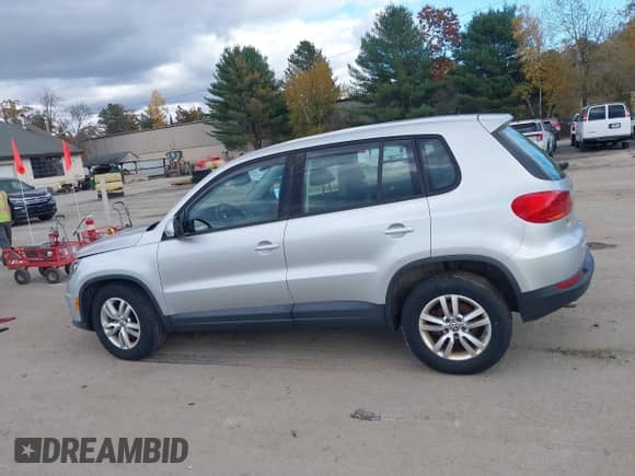 2014 Volkswagen Tiguan S with VIN WVGBV3AXXEW596502, listed as a IAAI auction lot 43538779 with 111,908 mi miles and . Bid and sale history available at DreamBid. Image 14.