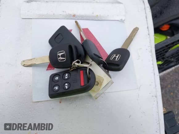 2008 Honda Odyssey EX-L with VIN 5FNRL38638B079556, listed as a IAAI auction lot 43516438 with 286,652 mi miles and . Bid and sale history available at DreamBid. Image 11.