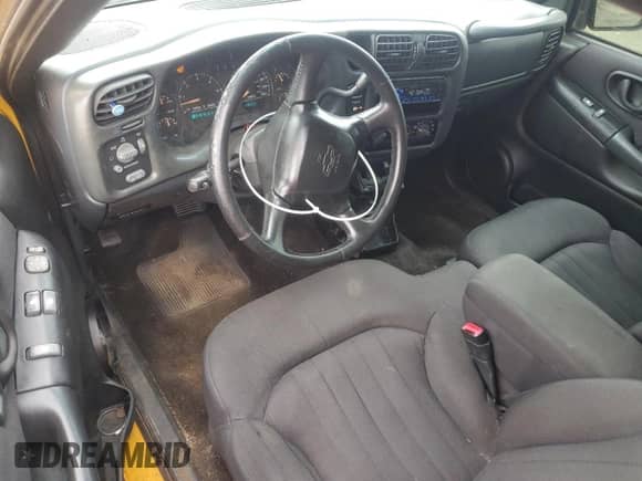 2003 Chevrolet S-10 LS with VIN 1GCCS19X938159618, listed as a Copart auction lot 68737085 with 138,434 mi miles and Salvage title. Bid and sale history available at DreamBid. Image 8.
