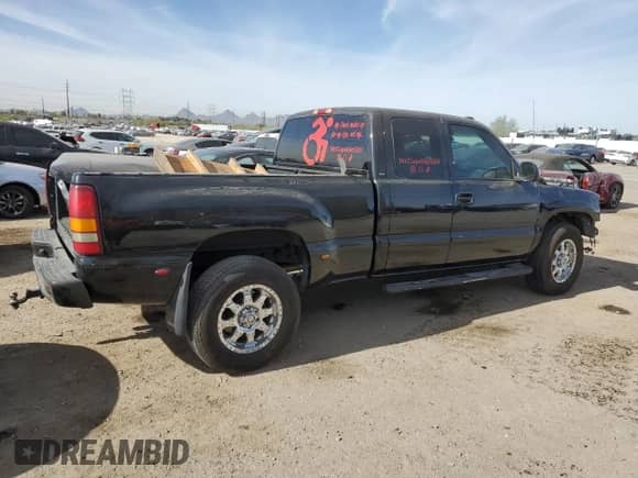 2002 GMC Sierra 1500 Denali z VIN 2GTFK69U521173050, wystawiony jako Copart lot #84276954 z przebiegiem Nie podano mil oraz Szkoda całkowita • Salvage title. Historia ofert i sprzedaży dostępna na DreamBid. Obrazek 3.