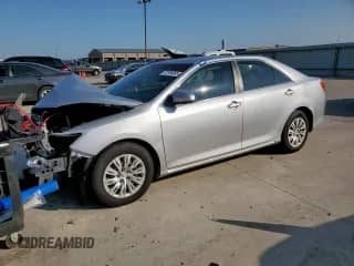 2014 Toyota Camry L с VIN 4T4BF1FK6ER350885, выставлен на аукционе Copart как лот 72104345 с пробегом 168 250 миль миль и Списание • Salvage title. История ставок и продаж доступна на DreamBid. Изображение 1.