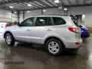 2012 Hyundai Santa Fe GLS z VIN 5XYZGDAB8CG119715, wystawiony jako Copart lot #61458234 z przebiegiem 140 378 mil mil oraz Szkoda całkowita • Salvage title. Historia ofert i sprzedaży dostępna na DreamBid. Obrazek 2.