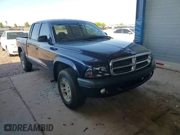 2004 Dodge Dakota Sport с VIN 1D7HL38K44S780585, выставлен на аукционе Copart как лот 60145595 с пробегом 115 844 миль миль и Списание • Salvage title. История ставок и продаж доступна на DreamBid. Изображение 13.
