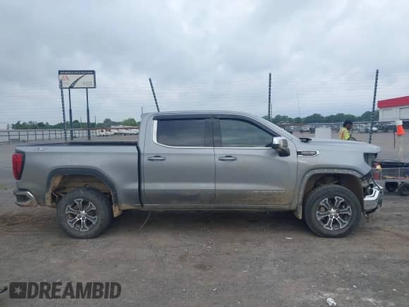 2024 GMC Sierra 1500 SLE with VIN 1GTUUBED1RZ120282, listed as a IAAI auction lot 42236278 with Not provided miles and . Bid and sale history available at DreamBid. Image 14.