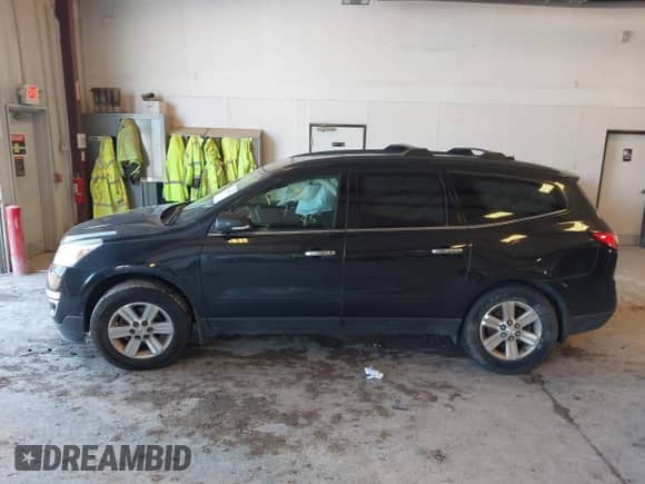 2014 Chevrolet Traverse LT z VIN 1GNKVGKD6EJ346159, wystawiony jako IAAI lot #42859053 z przebiegiem 166 210 mil mil oraz . Historia ofert i sprzedaży dostępna na DreamBid. Obrazek 14.