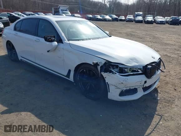 2016 BMW 7 Series 750i xDrive z VIN WBA7F2C54GG419323, wystawiony jako IAAI lot #41791378 z przebiegiem 90 582 mil mil oraz . Historia ofert i sprzedaży dostępna na DreamBid. Obrazek 17.