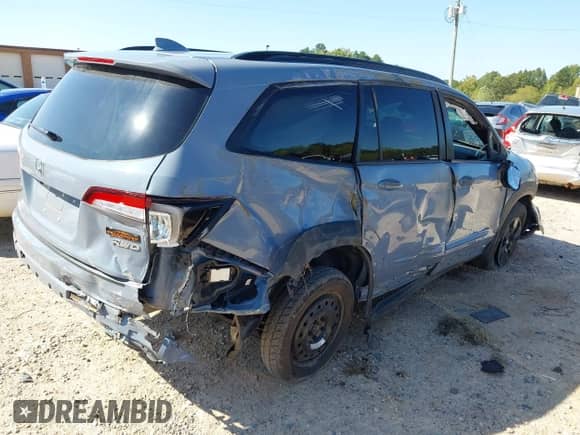 2022 Honda Pilot TrailSport with VIN 5FNYF6H82NB081283, listed as a IAAI auction lot 43163408 with 37,827 mi miles and . Bid and sale history available at DreamBid. Image 4.