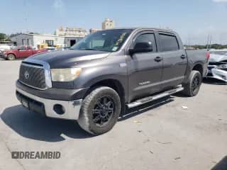 2012 Toyota Tundra z VIN 5TFEY5F11CX119571, wystawiony jako Copart lot #67968935 z przebiegiem 259 927 mil mil oraz Szkoda całkowita • Salvage title. Historia ofert i sprzedaży dostępna na DreamBid. Obrazek 1.