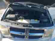 2009 Dodge Nitro SE z VIN 1D8GU28K59W525992, wystawiony jako IAAI lot #43391581 z przebiegiem 180 411 mil mil oraz . Historia ofert i sprzedaży dostępna na DreamBid. Obrazek 10.