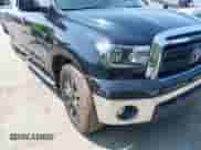 2012 Toyota Tundra z VIN 5TFRU5F18CX026186, wystawiony jako IAAI lot #42414319 z przebiegiem 216 128 mil mil oraz . Historia ofert i sprzedaży dostępna na DreamBid. Obrazek 18.