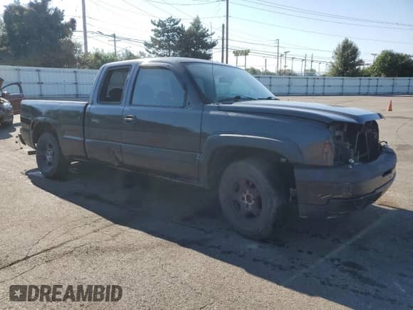 2005 Chevrolet Silverado 1500 Work Truck with VIN 1GCEC19XX5Z165088, listed as a Copart auction lot 71112955 with Not provided miles and Salvage title. Bid and sale history available at DreamBid. Image 4.
