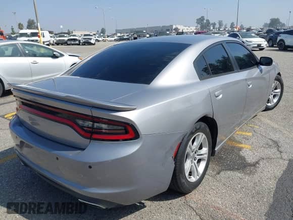 2015 Dodge Charger SE with VIN 2C3CDXBG8FH837060, listed as a IAAI auction lot 43397005 with 102,616 mi miles and . Bid and sale history available at DreamBid. Image 4.