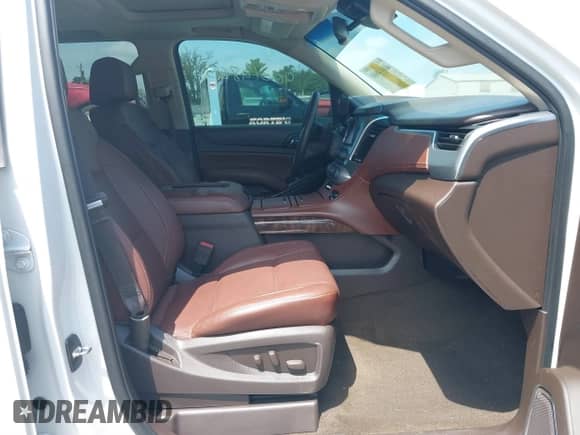 2017 Chevrolet Tahoe Premier with VIN 1GNSKCKC6HR248439, listed as a IAAI auction lot 40014860 with 97,983 mi miles and . Bid and sale history available at DreamBid. Image 5.