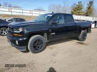 2017 Chevrolet Silverado 1500 LT z VIN 1GCVKREC4HZ407950, wystawiony jako Copart lot #50971165 z przebiegiem 147 454 mil mil oraz Szkoda całkowita • Salvage title. Historia ofert i sprzedaży dostępna na DreamBid. Obrazek 1.