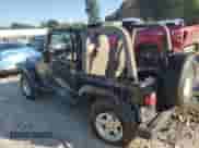 2004 Jeep Wrangler Sahara с VIN 1J4FA59S24P802033, выставлен на аукционе Copart как лот 82044915 с пробегом 111 762 миль миль и Списание • Salvage title. История ставок и продаж доступна на DreamBid. Изображение 2.