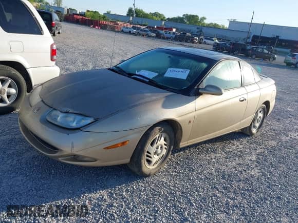 2001 Saturn SC with VIN 1G8ZR12741Z248708, listed as a IAAI auction lot 42044365 with 200,697 mi miles and . Bid and sale history available at DreamBid. Image 2.