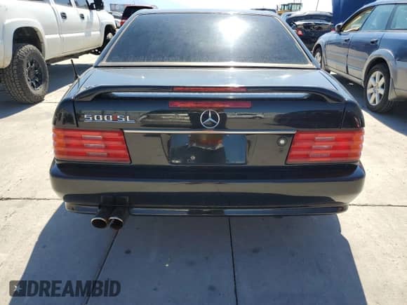1992 Mercedes-Benz SL с VIN WDBFA66E2NF060135, выставлен на аукционе Copart как лот 71704754 с пробегом 118 204 миль миль и Списание • Salvage title. История ставок и продаж доступна на DreamBid. Изображение 6.