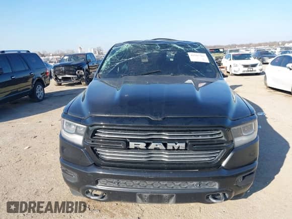 2021 Ram 1500 Laramie with VIN 1C6RREJT1MN710141, listed as a IAAI auction lot 41247763 with Not provided miles and . Bid and sale history available at DreamBid. Image 11.
