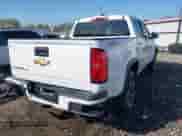 2018 Chevrolet Colorado 4WD Work Truck z VIN 1GCGTBEN1J1109892, wystawiony jako IAAI lot #41990388 z przebiegiem 100 767 mil mil oraz . Historia ofert i sprzedaży dostępna na DreamBid. Obrazek 4.