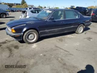 1994 BMW 7 Series with VIN WBAGD8322RDE92891, listed as a Copart auction lot 82638705 with 194,269 mi miles and Clean title. Bid and sale history available at DreamBid. Image 1.