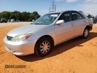 2003 Toyota Camry LE с VIN 4T1BE32K63U746598, выставлен на аукционе Copart как лот 71235295 с пробегом 365 622 миль миль и Списание • Salvage title. История ставок и продаж доступна на DreamBid. Изображение 1.