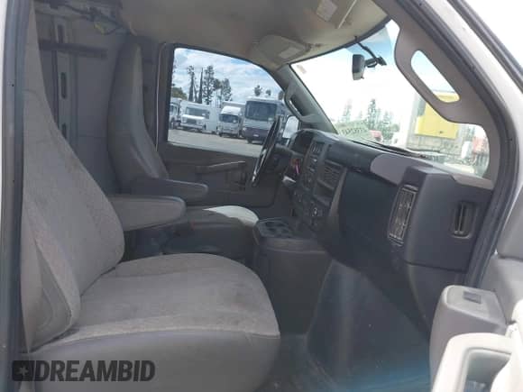 2018 Chevrolet Express Cargo with VIN 1GCWGAFGXJ1200976, listed as a IAAI auction lot 43382543 with 261,043 mi miles and . Bid and sale history available at DreamBid. Image 5.