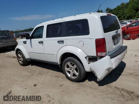 2011 Dodge Nitro SE z VIN 1D4PT2GK6BW595285, wystawiony jako Copart lot #80345735 z przebiegiem 168 147 mil mil oraz Szkoda całkowita • Salvage title. Historia ofert i sprzedaży dostępna na DreamBid. Obrazek 2.