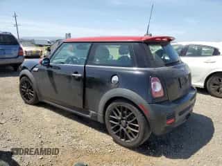 2013 MINI Hardtop John Cooper Works with VIN WMWSU9C58DT722617, listed as a Copart auction lot 57356095 with 202,230 mi miles and Salvage title. Bid and sale history available at DreamBid. Image 2.