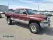 2000 Dodge 1500 with VIN 3B7HF12ZXYG129339, listed as a Copart auction lot 51156455 with 167,808 mi miles and Salvage title. Bid and sale history available at DreamBid. Image 4.