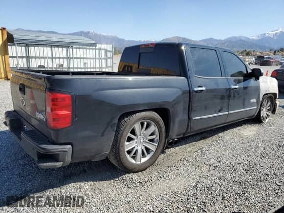 2014 Chevrolet Silverado 1500 High Country z VIN 3GCPCTEC5EG391434, wystawiony jako Copart lot #49719065 z przebiegiem Nie podano mil oraz Szkoda całkowita • Salvage title. Historia ofert i sprzedaży dostępna na DreamBid. Obrazek 3.