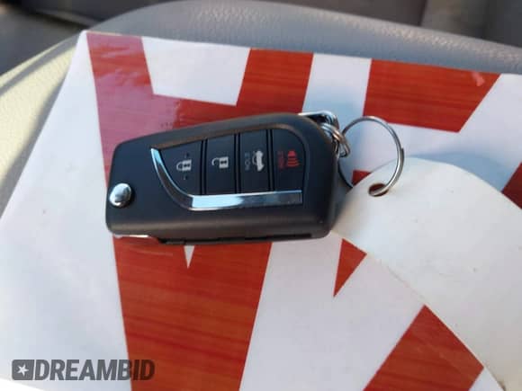 2021 Toyota Camry LE with VIN 4T1C11AK2MU472694, listed as a IAAI auction lot 43340745 with 61,965 mi miles and . Bid and sale history available at DreamBid. Image 11.