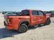 2025 Nissan Frontier Pro-4X with VIN 1N6ED1EK9SN615210, listed as a Copart auction lot 66765225 with 19,984 mi miles and Salvage title. Bid and sale history available at DreamBid. Image 3.