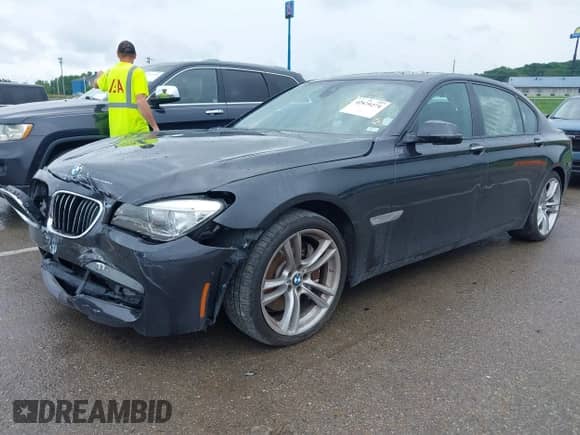 2013 BMW 7 Series 750Li with VIN WBAYE8C5XDD132883, listed as a IAAI auction lot 42470274 with 96,047 mi miles and . Bid and sale history available at DreamBid. Image 2.
