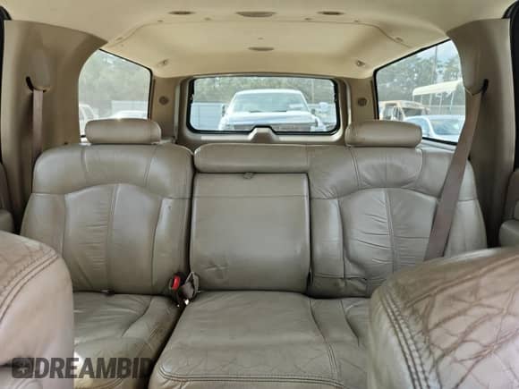 2002 Chevrolet Suburban LT с VIN 1GNEC16Z92J247398, выставлен на аукционе Copart как лот 83819575 с пробегом 341 289 миль миль и Списание • Salvage title. История ставок и продаж доступна на DreamBid. Изображение 10.
