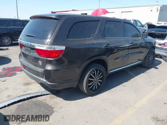 2013 Dodge Durango SXT with VIN 1C4RDHAG4DC552529, listed as a IAAI auction lot 42678572 with 126,428 mi miles and . Bid and sale history available at DreamBid. Image 4.