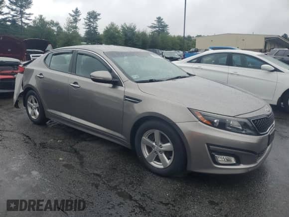 2015 Kia Optima LX z VIN 5XXGM4A70FG511768, wystawiony jako Copart lot #64061395 z przebiegiem 99 365 mil mil oraz Szkoda całkowita • Salvage title. Historia ofert i sprzedaży dostępna na DreamBid. Obrazek 4.