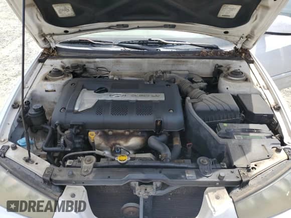 2003 Hyundai Elantra GLS z VIN KMHDN45D63U595788, wystawiony jako Copart lot #59692984 z przebiegiem 119 573 mil mil oraz Szkoda całkowita • Salvage title. Historia ofert i sprzedaży dostępna na DreamBid. Obrazek 12.