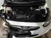 2012 Hyundai Accent SE z VIN KMHCU5AE6CU054999, wystawiony jako Copart lot #81822645 z przebiegiem 95 131 mil mil oraz Szkoda całkowita • Salvage title. Historia ofert i sprzedaży dostępna na DreamBid. Obrazek 11.