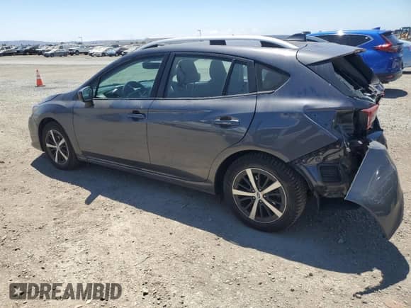 2020 Subaru Impreza Premium with VIN 4S3GTAV62L3732626, listed as a Copart auction lot 66662875 with 59,777 mi miles and Salvage title. Bid and sale history available at DreamBid. Image 2.