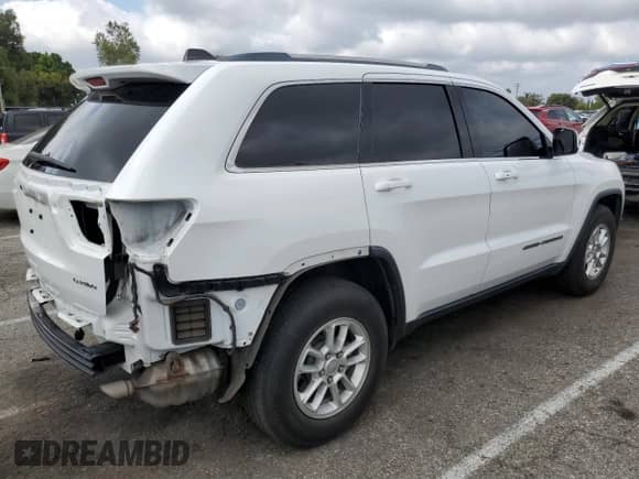 2018 Jeep Grand Cherokee Laredo z VIN 1C4RJEAG6JC311915, wystawiony jako Copart lot #54750495 z przebiegiem 70 062 mil mil oraz Szkoda całkowita • Salvage title. Historia ofert i sprzedaży dostępna na DreamBid. Obrazek 3.