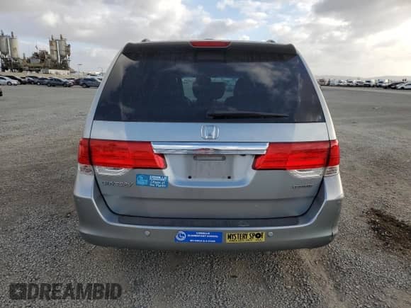 2009 Honda Odyssey Touring with VIN 5FNRL38989B040375, listed as a Copart auction lot 82321765 with 167,692 mi miles and Salvage title. Bid and sale history available at DreamBid. Image 6.