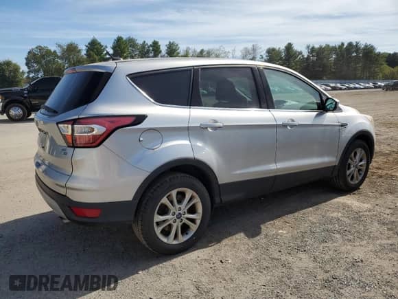 2017 Ford Escape SE с VIN 1FMCU9GD3HUC41579, выставлен на аукционе Copart как лот 84071535 с пробегом 142 241 миль миль и Чистый • Clean title. История ставок и продаж доступна на DreamBid. Изображение 3.