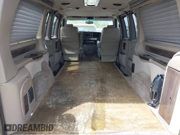 2003 Chevrolet Express Cargo YF7 Upfitter z VIN 1GBFG15T931133910, wystawiony jako IAAI lot #42231852 z przebiegiem 104 198 mil mil oraz . Historia ofert i sprzedaży dostępna na DreamBid. Obrazek 8.