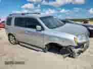 2014 Honda Pilot EX-L with VIN 5FNYF3H58EB004759, listed as a Copart auction lot 83860835 with 135,085 mi miles and Clean title. Bid and sale history available at DreamBid. Image 4.